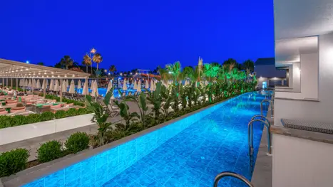 Swim-up pool by night